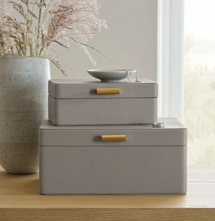 Shagreen leather decorative boxes styled on a console